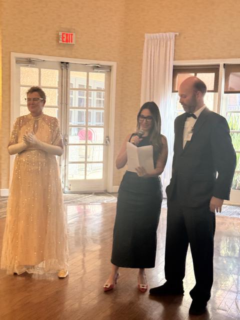Three guests in formal 1920s attire at the SoAPRA Kickoff 2026 social