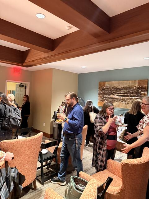 Members connecting across the room